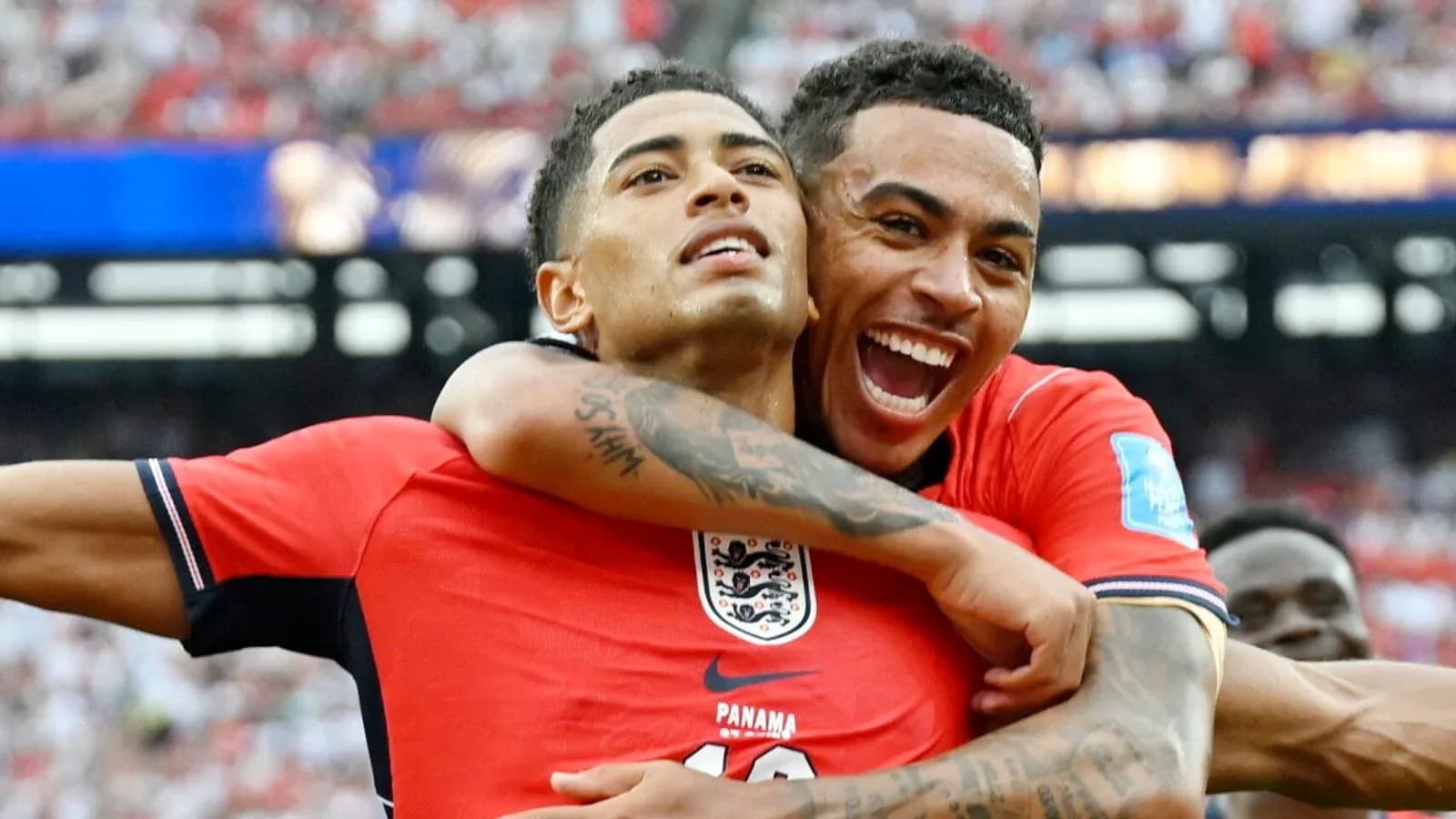 Two players celebrating together during a match