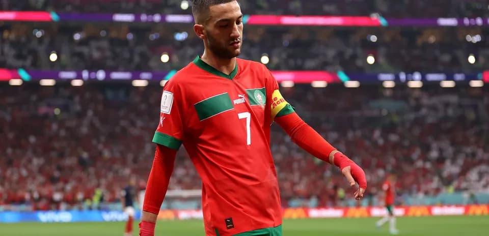 Hakim Ziyech walking off the pitch during match
