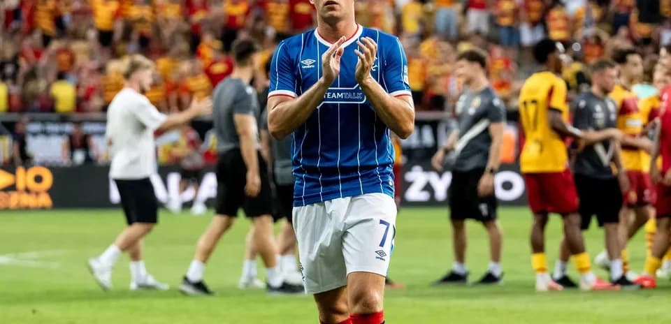 Rangers player applauding after the match