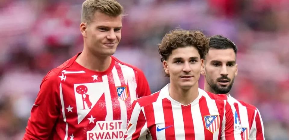 Atletico Madrid players in team jerseys before match