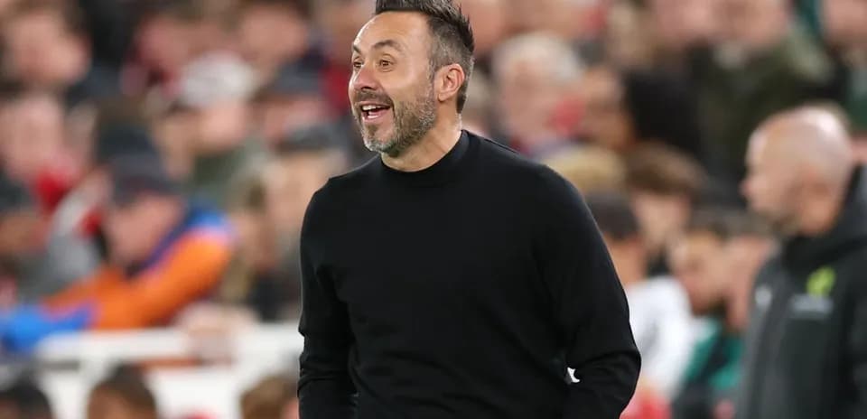 Manager instructing players during a match