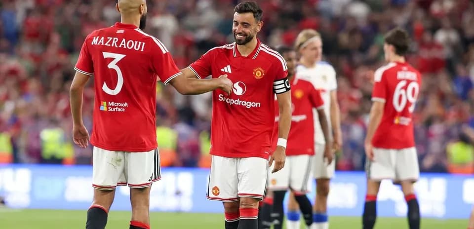 Bruno Fernandes and Mazraoui celebrating after match