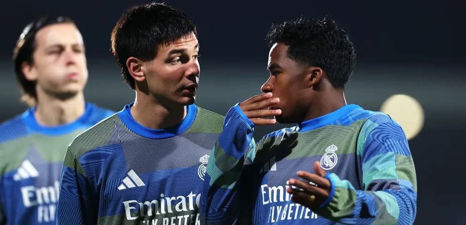 Two Real Madrid players talking during training session