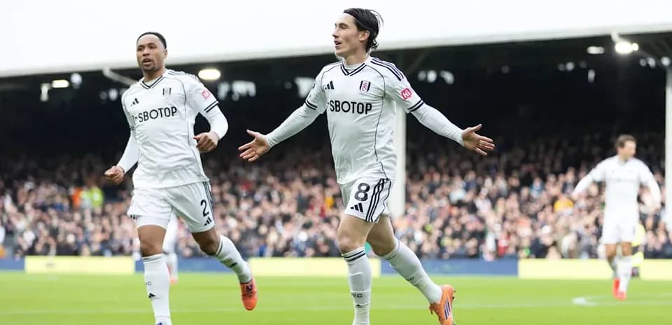 Fulham players celebrating a goal during match