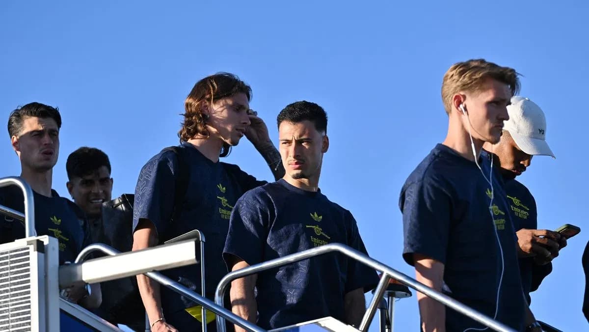 Players descending stairs in team training gear