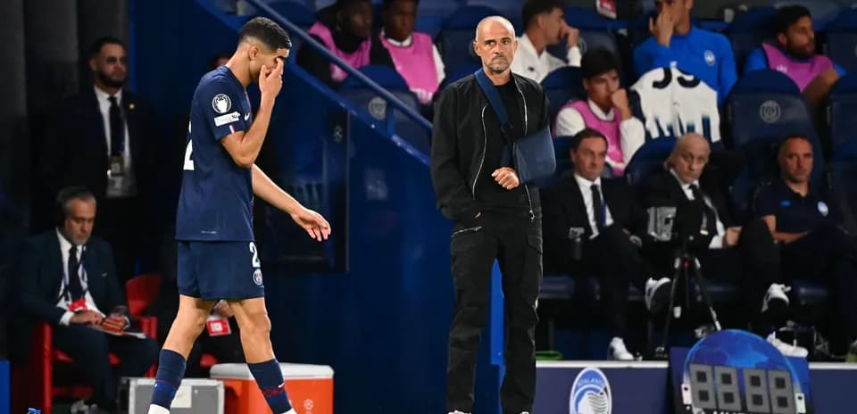 Player leaving field while coach observes during match