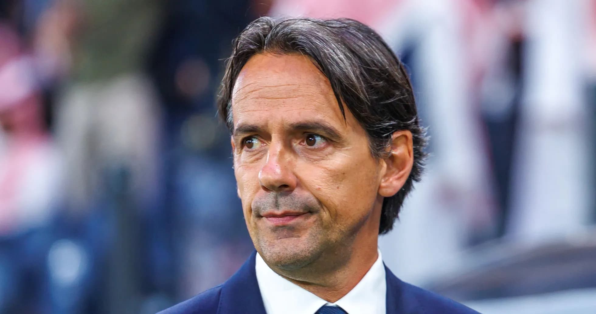 Coach observing the match from the sidelines