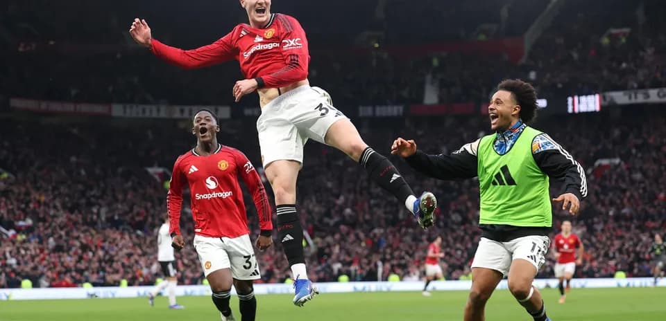 Manchester United players celebrating a goal