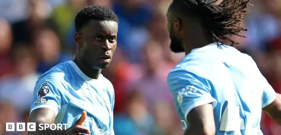 Two players discussing during a football match