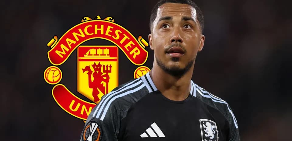 Aston Villa player in kit with Manchester United logo