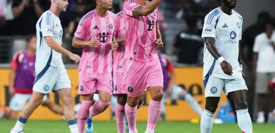 Players celebrating during a soccer match