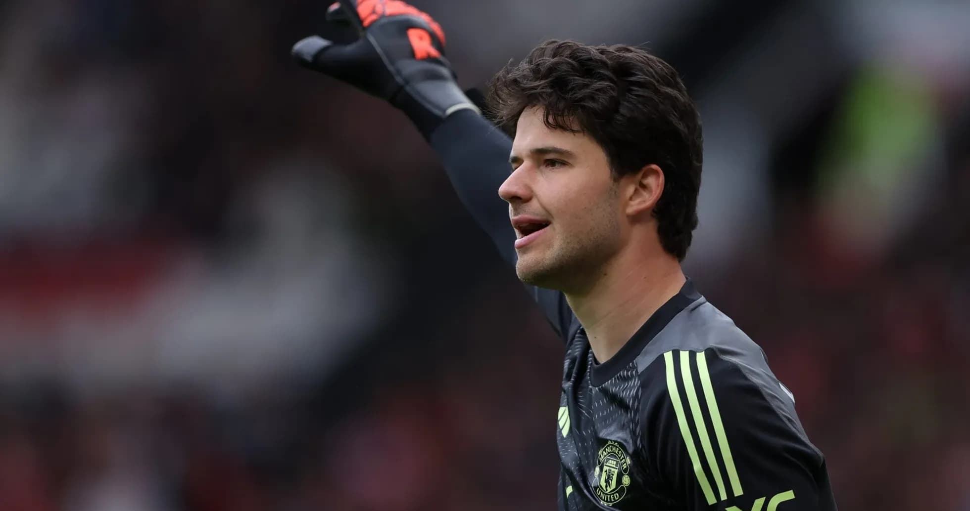 Goalkeeper gesturing during match for Manchester United