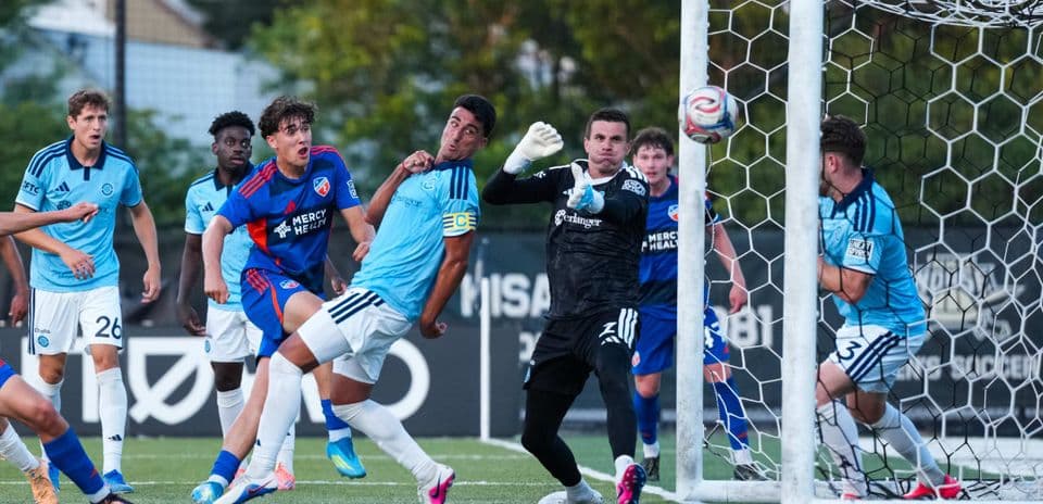Players contesting a goal during FC Cincinnati II match