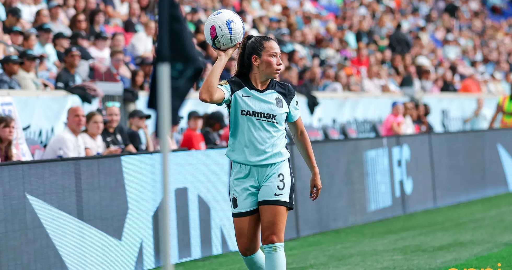 Player preparing for a throw-in during match