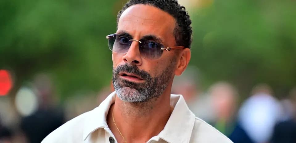 Man with sunglasses walking outdoors