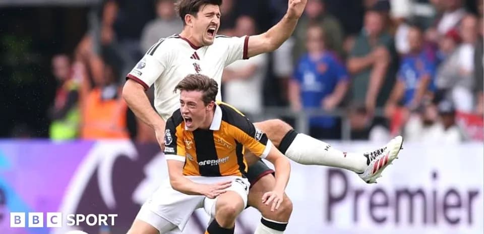 Player tackling opponent during a football match