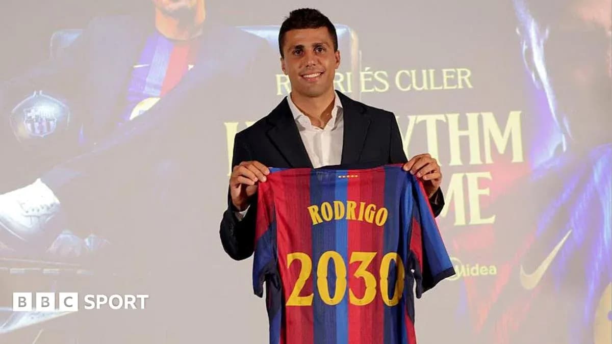 Player presenting Barcelona jersey with name Rodrigo