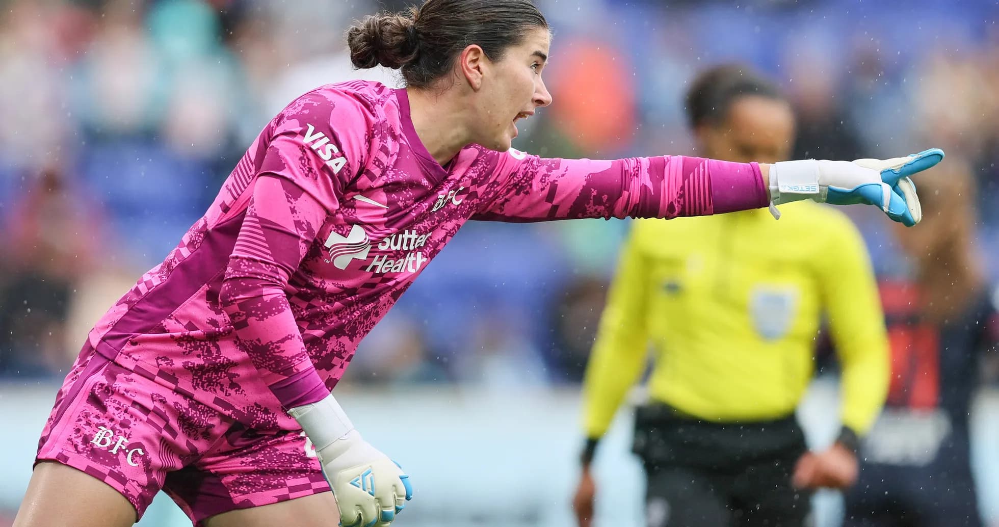 Goalkeeper directing play during NWSL match