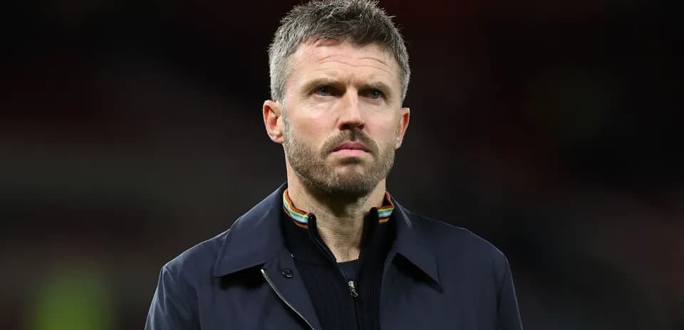 Coach standing on the sidelines during match