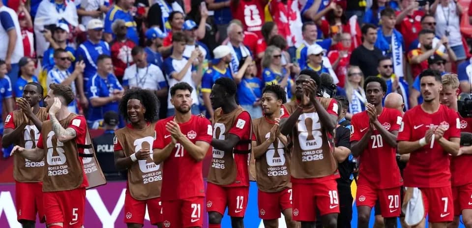 Canadian players applauding fans after match