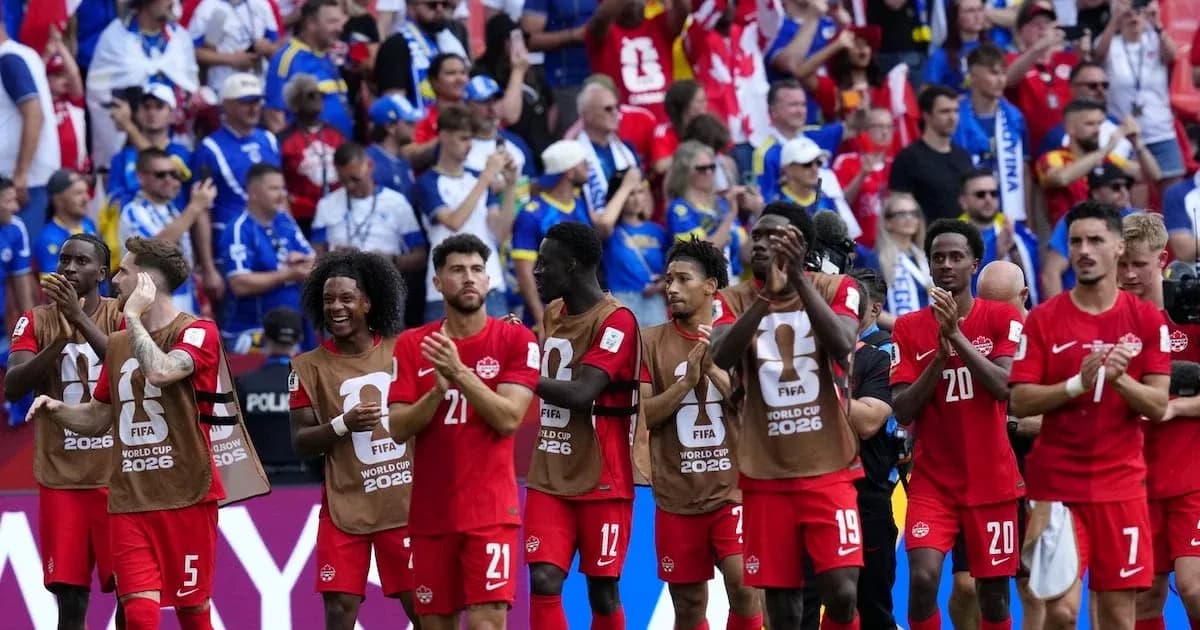 Canadian players applauding fans after match