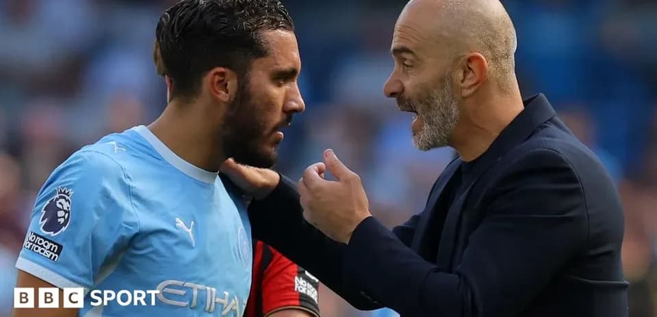 Coach discussing strategy with player during match