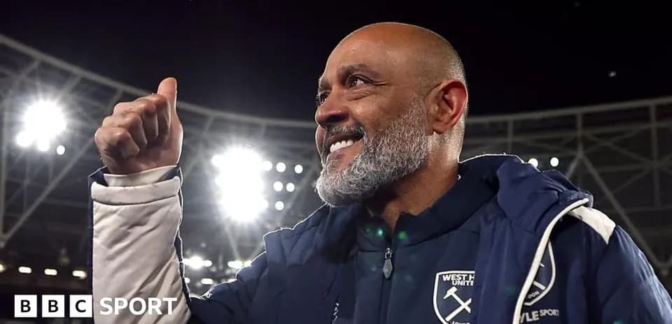 Manager celebrating with a thumbs up gesture
