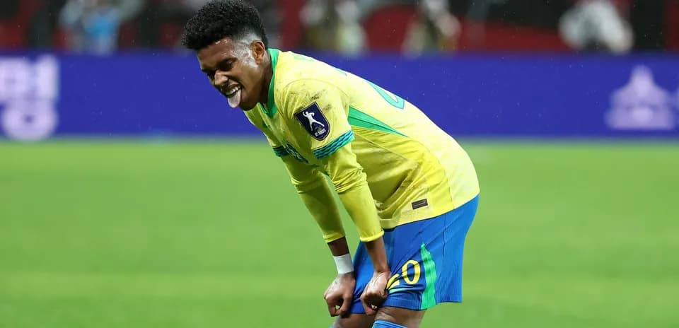 Player reacting during match in Brazil kit