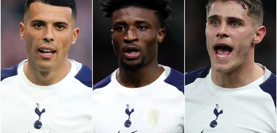 Three Tottenham players in team jerseys during match