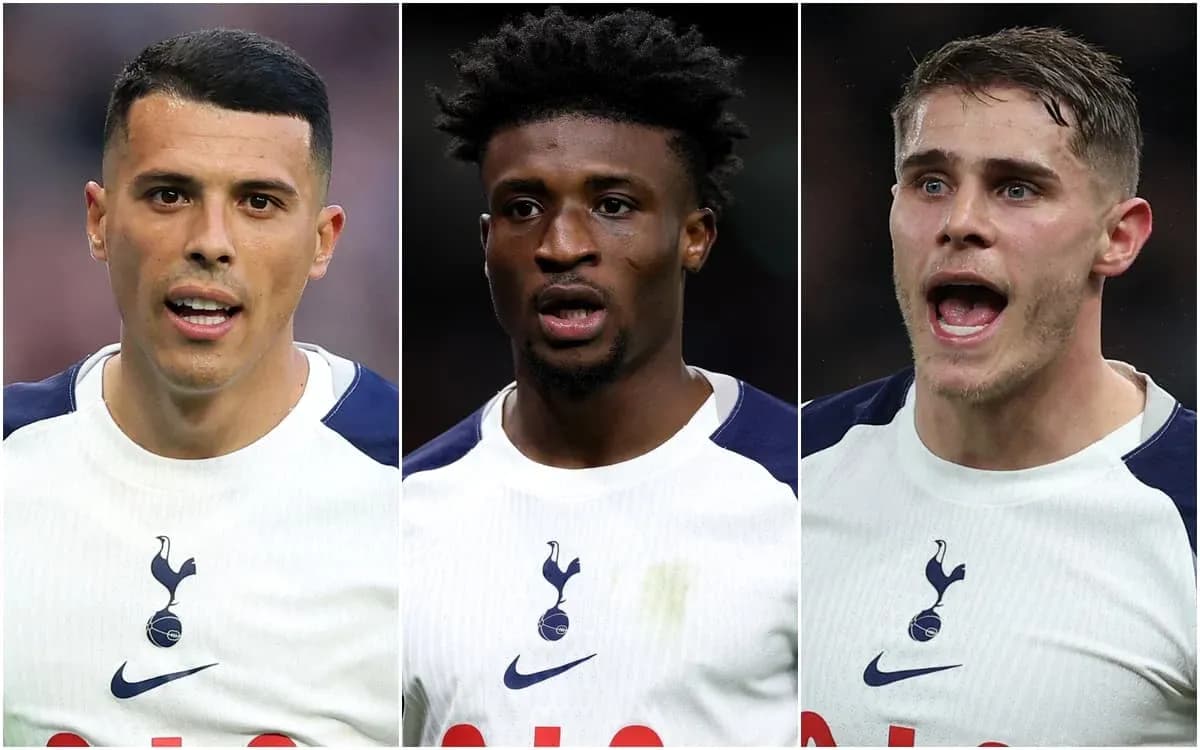 Three Tottenham players in team jerseys during match