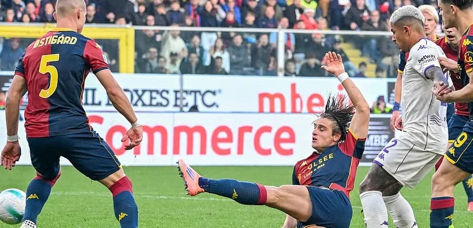 Players contesting the ball during Serie A match
