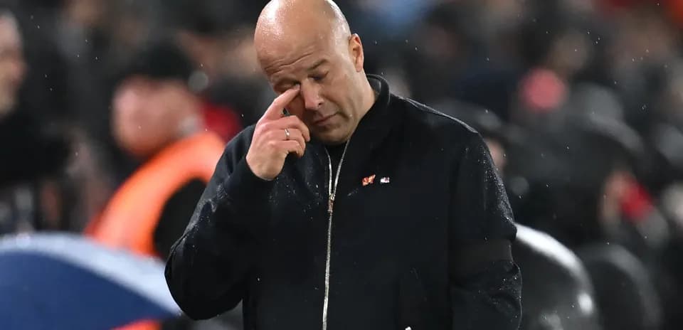 Coach wiping his eye during a match