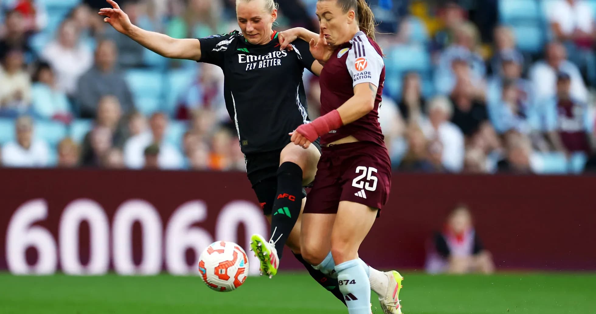 Players competing for the ball during match