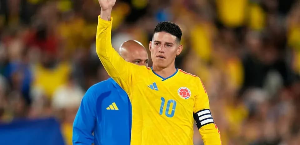 Player in yellow jersey waving during match