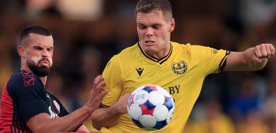 Mjallby player competing for the ball