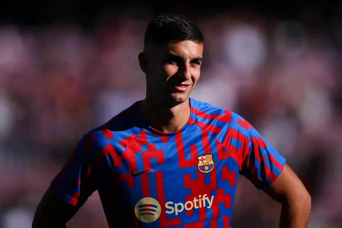 Player posing in FC Barcelona jersey during event