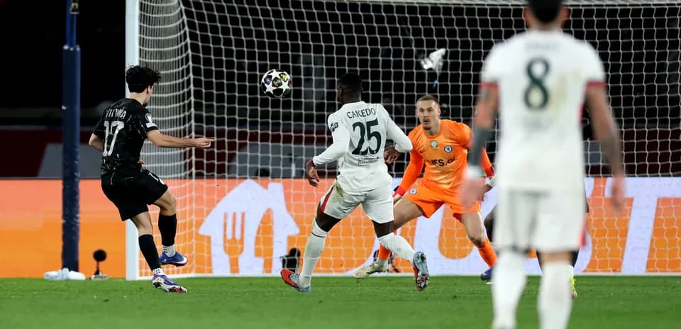 Player shooting on goal during Chelsea vs PSG match