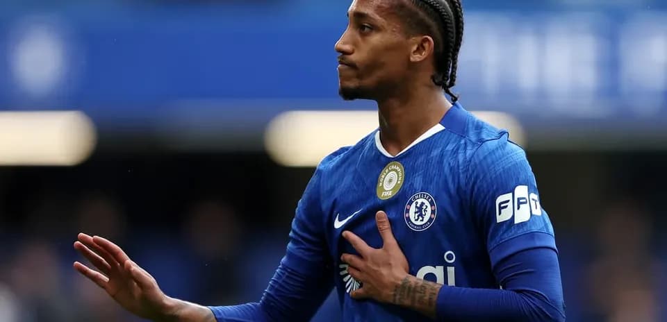 Chelsea player gesturing during a match