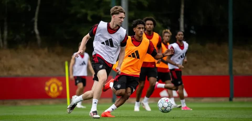 Players training on the pitch at Manchester United facility