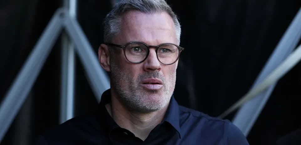 Man in glasses looking thoughtfully off-camera