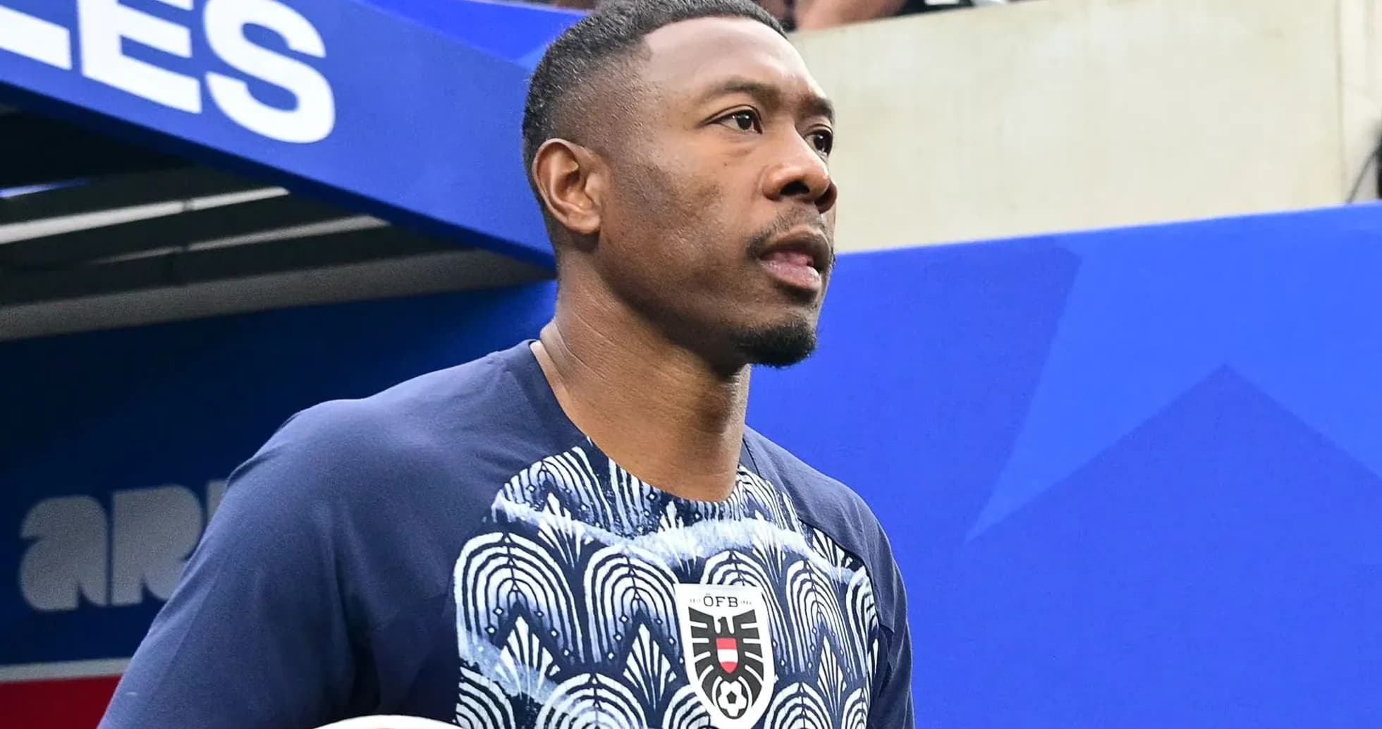 Player walking onto the pitch before the match