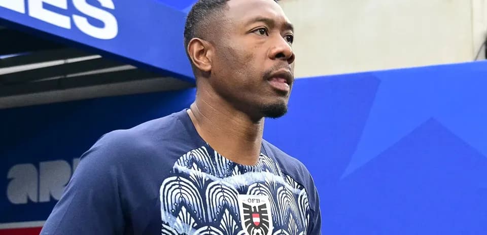 Player walking onto the pitch before the match