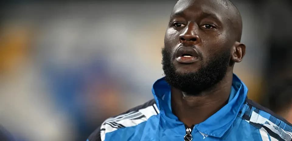 Player wearing Napoli training jacket before match