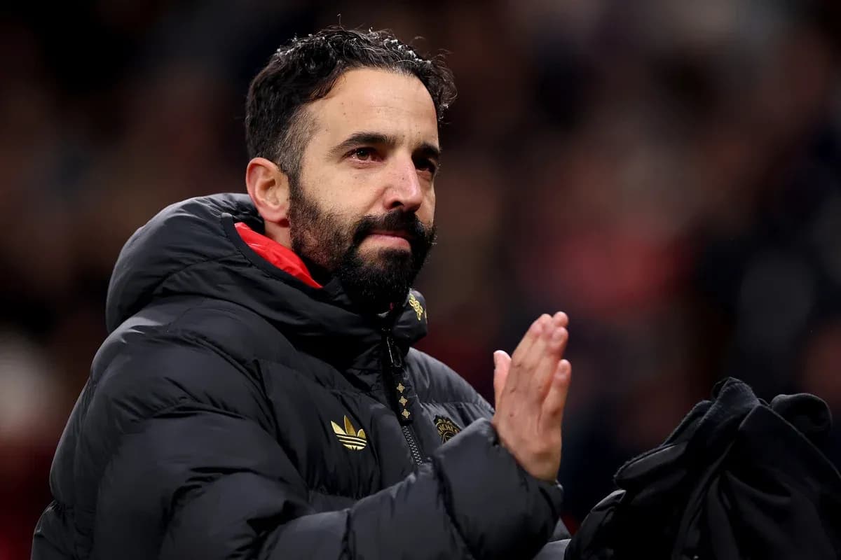 Coach applauding fans during match at stadium