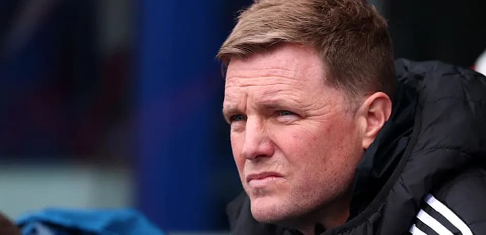 Coach observing the match from the sidelines