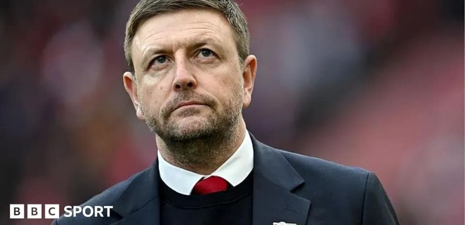 Manager looking focused before the match