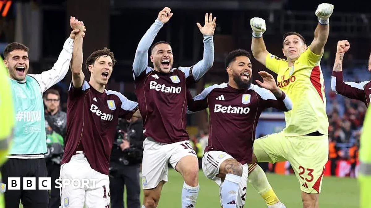 Aston Villa players celebrating a victory together