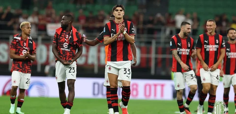 AC Milan players celebrating after the match