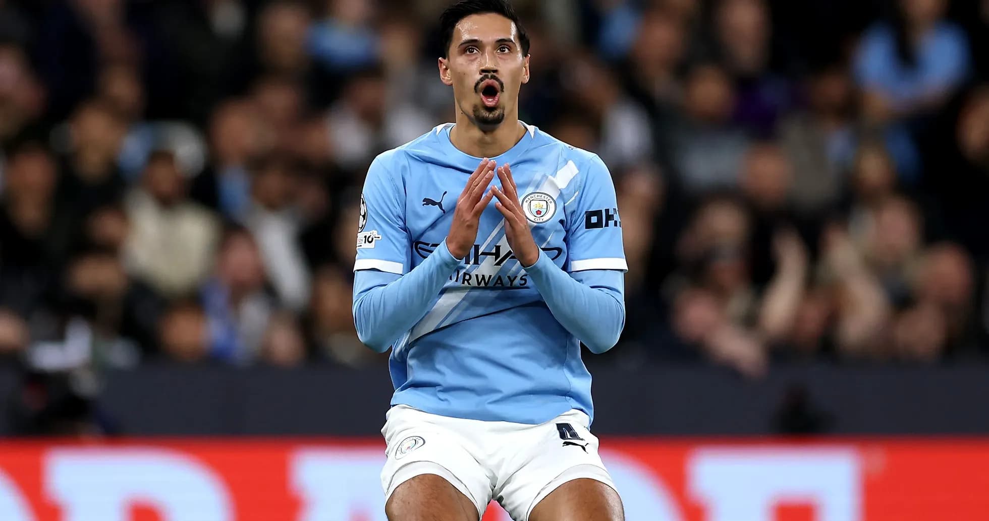 Player in Manchester City kit during match action