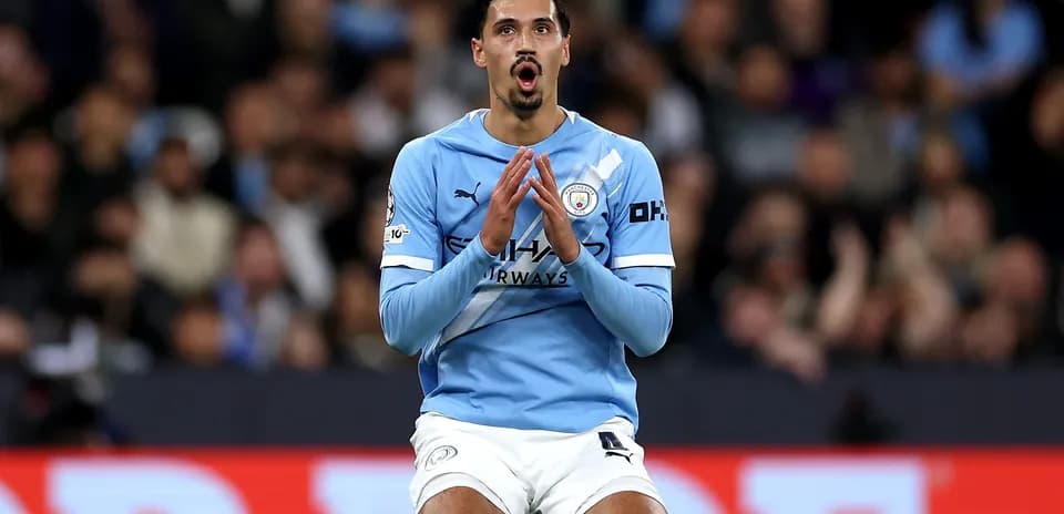 Player in Manchester City kit during match action
